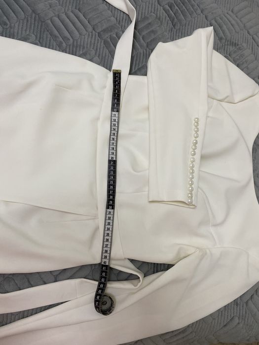 Весільня сукня в білому кольорі