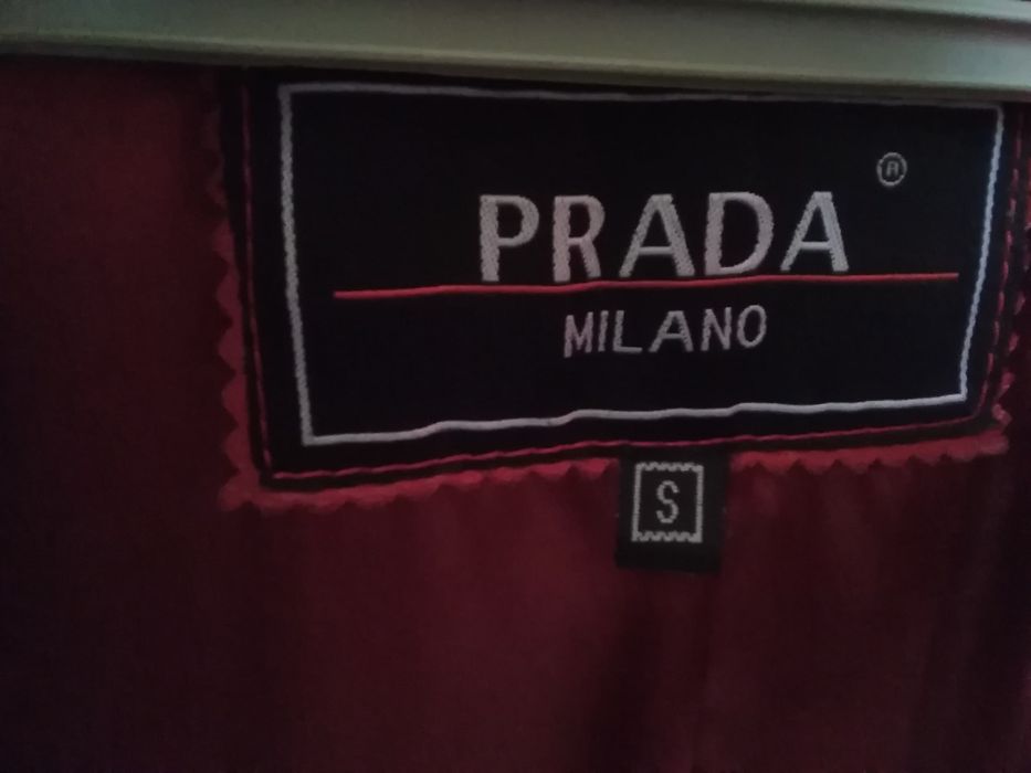 Женское кожанное пальто.