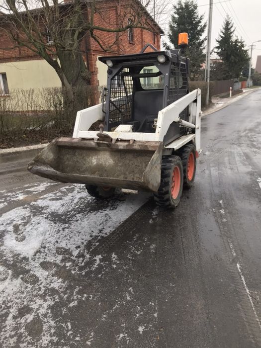 Usługi z miniładowarka Bobcat 543 transport LT46 z wywrotka