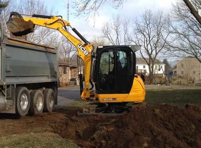 Послуги міні екскаватор , маніпулятор копання септиків септик під ключ