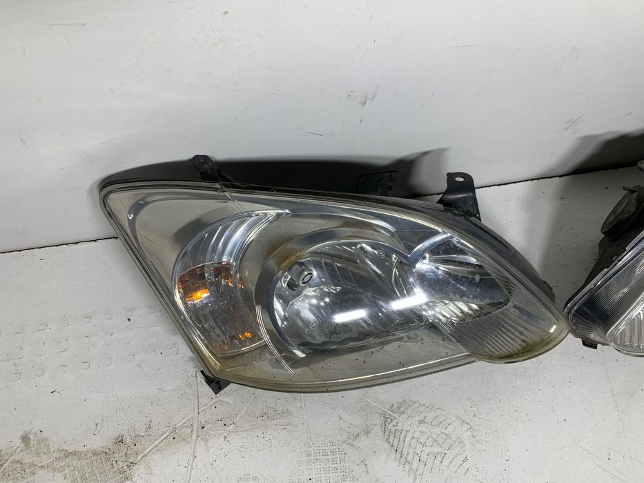 Prawy Lewy reflektor lampa EUROPA lampy przód toyota corolla E12 2006r
