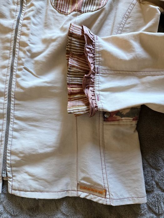 Conjunto de jaqueta e calças com padrão floral