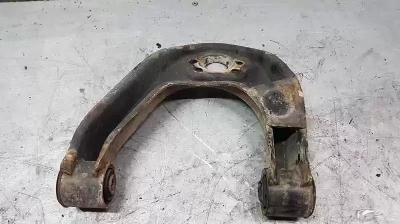BRAÇO SUSPENSÃO SUPERIOR FRONTAL ESQUERDO NISSAN CABSTAR 2006 -545249X502