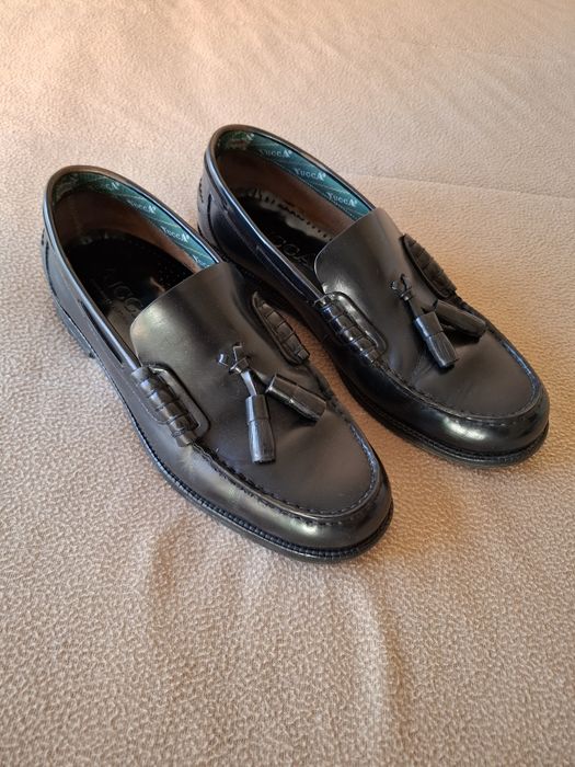 Sapatos clássicos em pele
