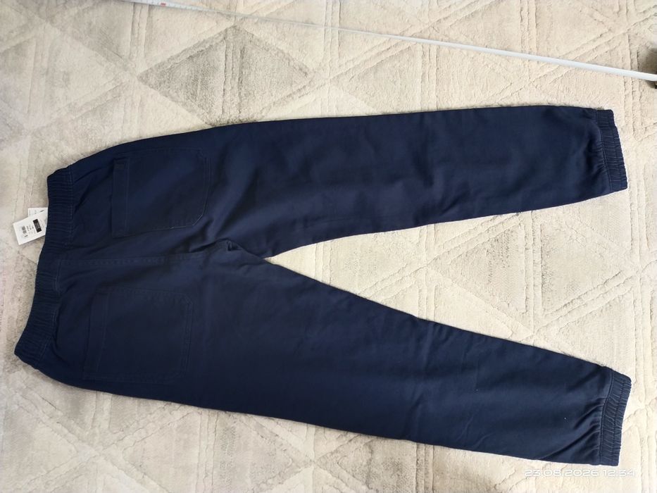 Spodnie nowe 152