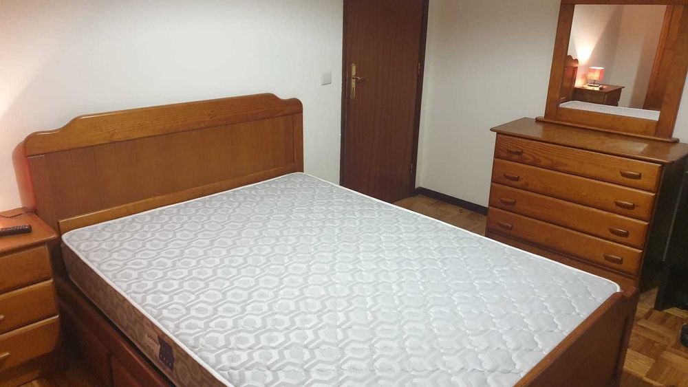 Quarto com varanda e TV