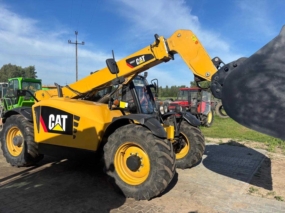 Ładowarka teleskopowa caterpillar TH337 nie jcb