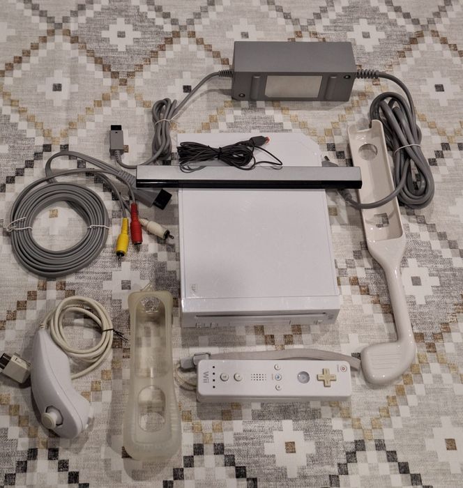 Nintendo Wii com 52 jogos digitais.