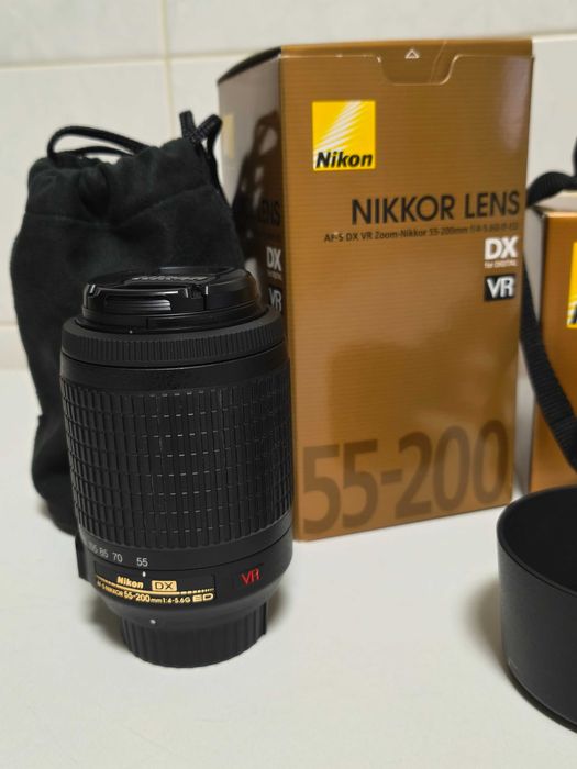 Nikon D3100 Pack com duas objetivas e acessórios. Como novo.
