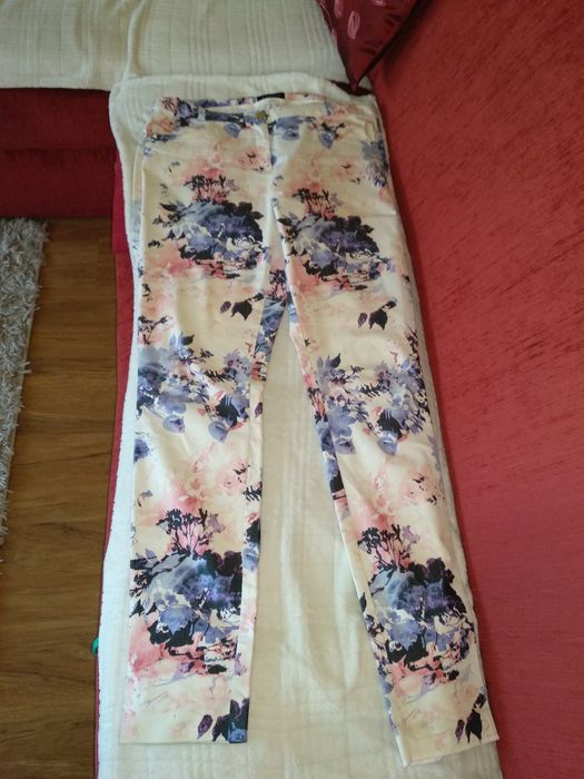 Spodnie damskie Mohito roz 42