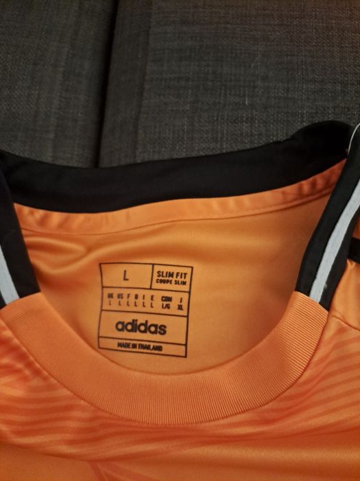 Camisola Real Madrid 2024-25 laranja Vini Jr