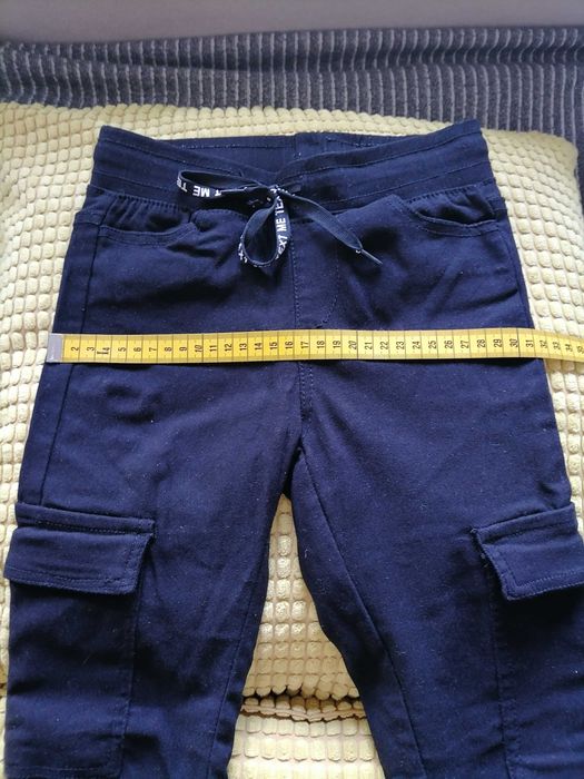Spodnie legginsy dziewczęce czarne typu bojówki rozm 134