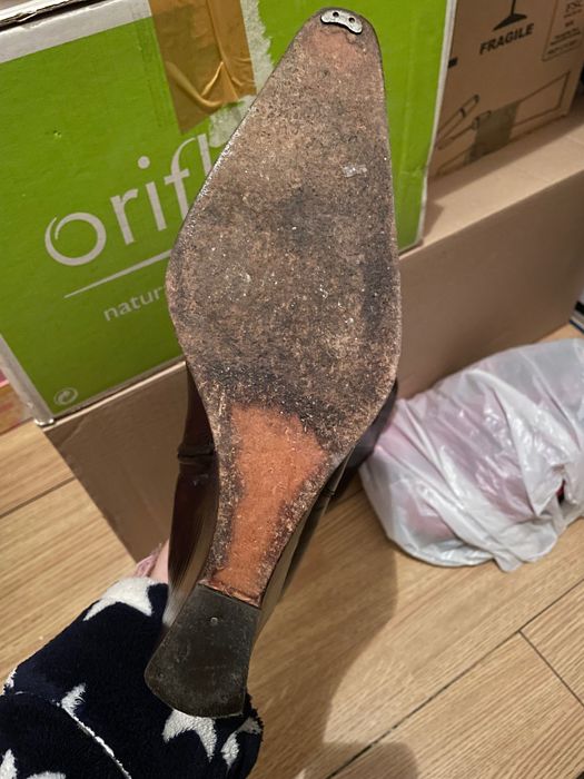 Botas em pele da strenna