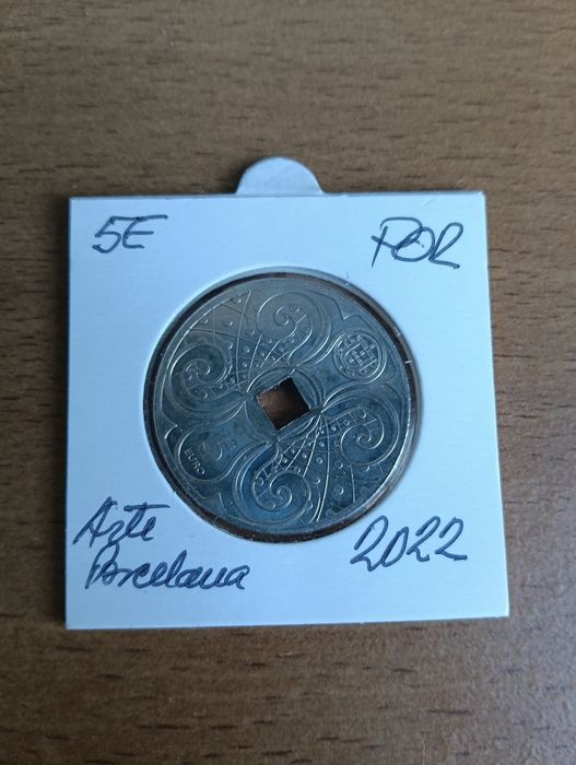 4 moedas de 5€ e uma de 7,5€
