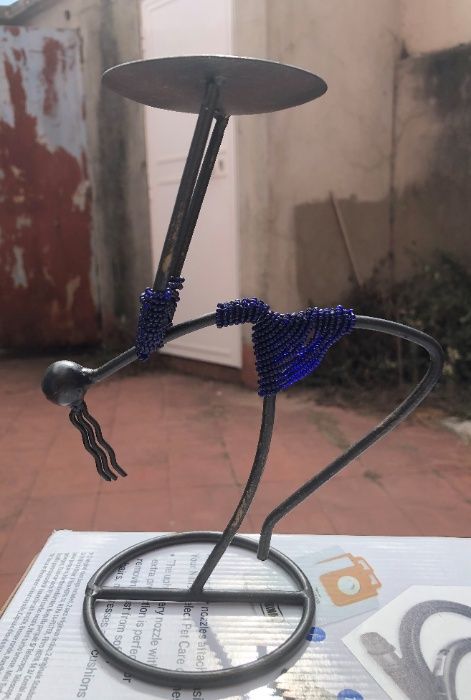 Castiçais em metal