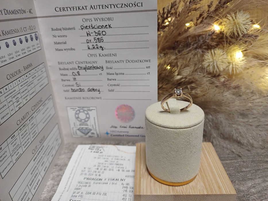 Złoty pierścionek z brylantem P585 2,22g rozmiar 17" certyfikat