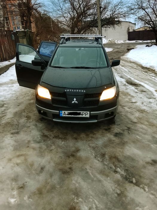 Оутлендр 1поколение 2007год