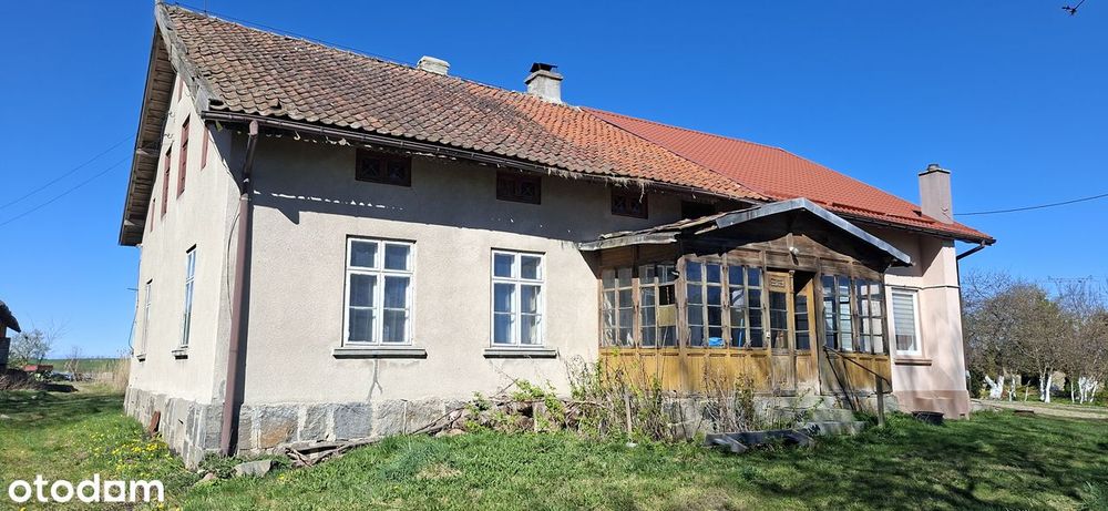 Połowa poniemieckiego domu w spokojnej okolicy