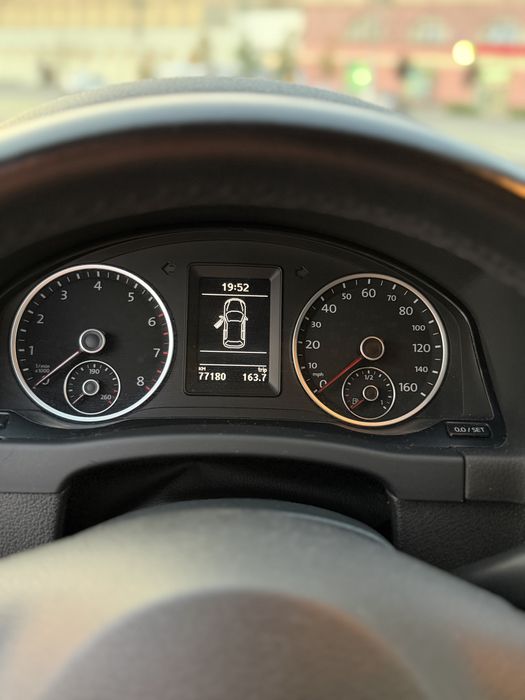 Volkswagen Tiguan 2013 VIN WVGAV3AX4DW586252 фото оголошення 4 з 8