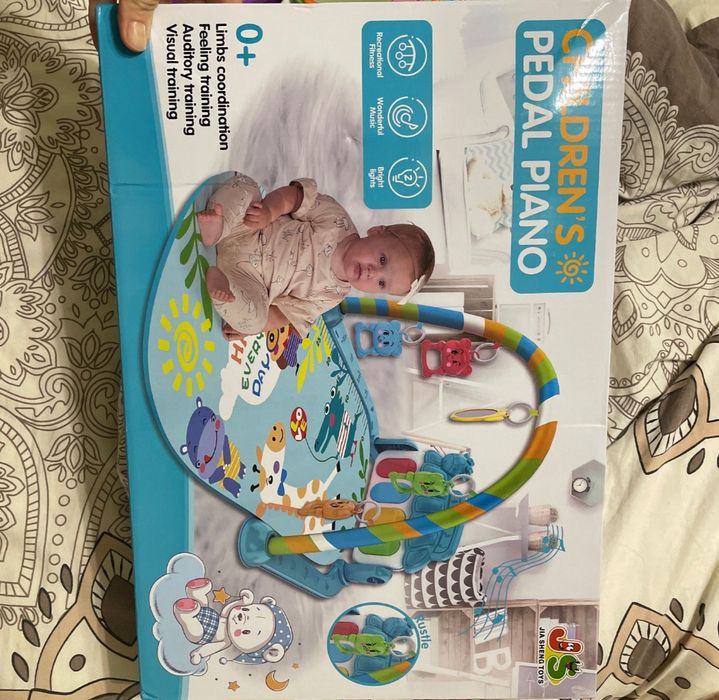 Музичний розвиваючий килимок.