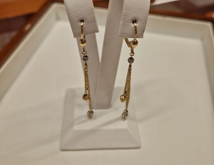 Złote kolczyki nowe