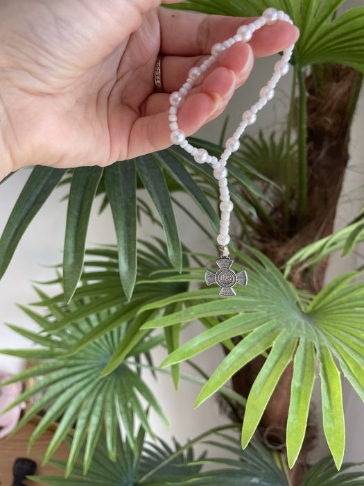 Pulceira tipo terço Menino Jesus de Praga