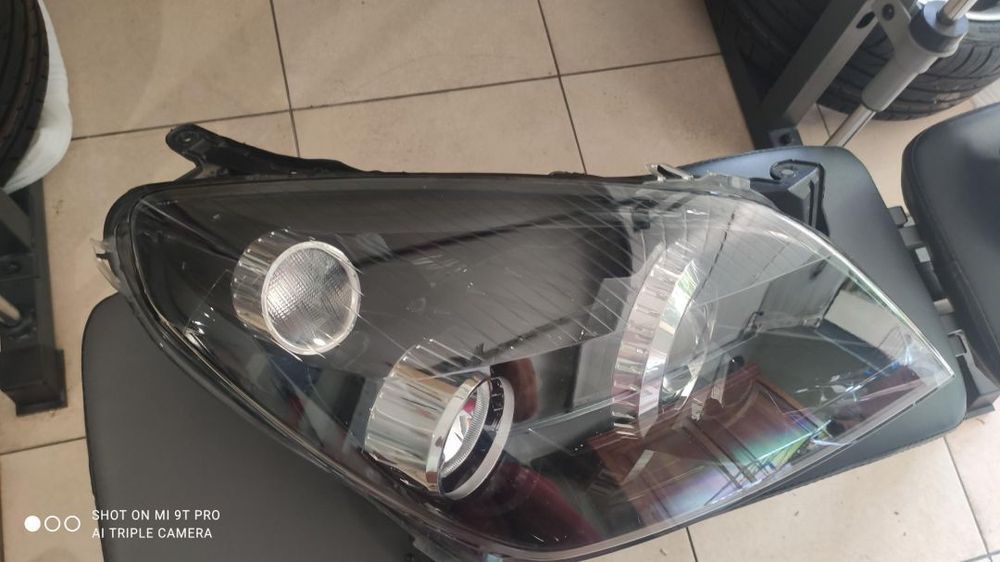 farol direito xenon Astra H