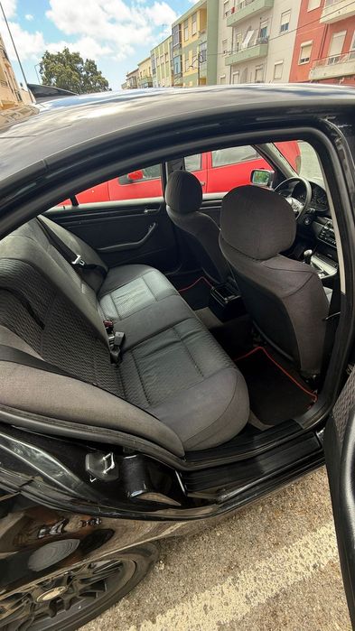 BMW E46 preto sedan