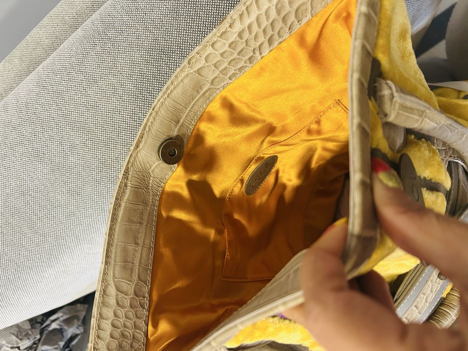 Mala NOVA ÉMOI,  em tecido com apontamentos em pele de vaca.