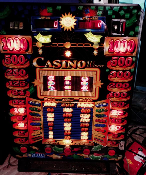 Барабанный механический игровой автомат.