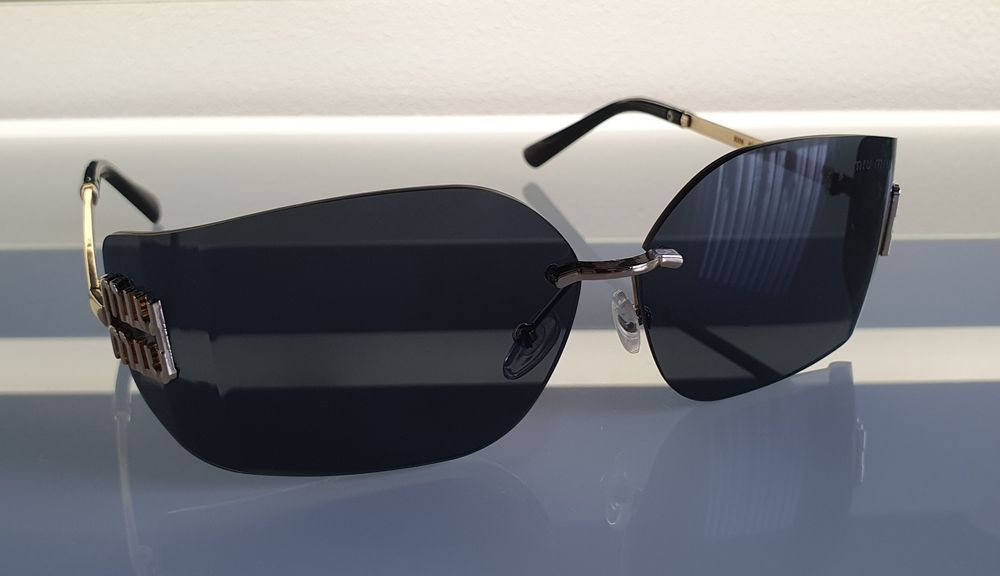 Okulary damskie Miu Miu