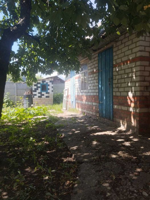 Продам 1/2 будинка район ХТЗ