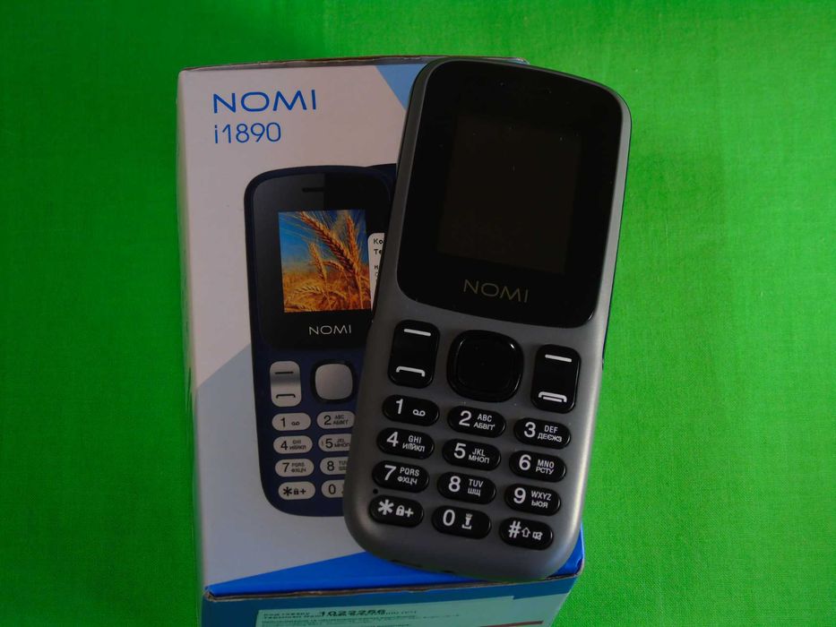 Мобільний телефон Nomi i1890 сірого кольору коробка документи стан іди
