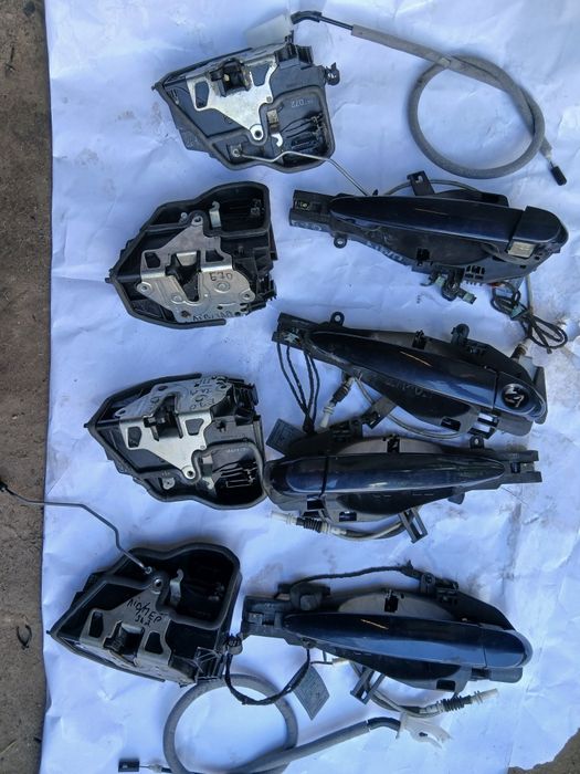 Замок дверей Е70 Ф10 F11 BMW замок защіпка двері ручка замка комплекти