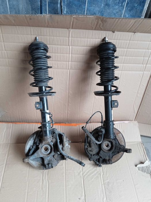 OPEL CORSA E 3D zwrotnica mcperson amortyzator piasta lewa prawa
