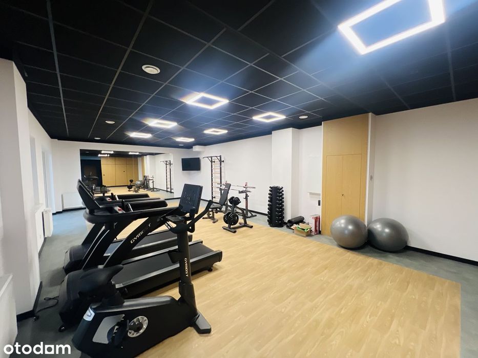 Elegancki Klimatyzowany Apartament z dostępem do SIŁOWNI Centrum