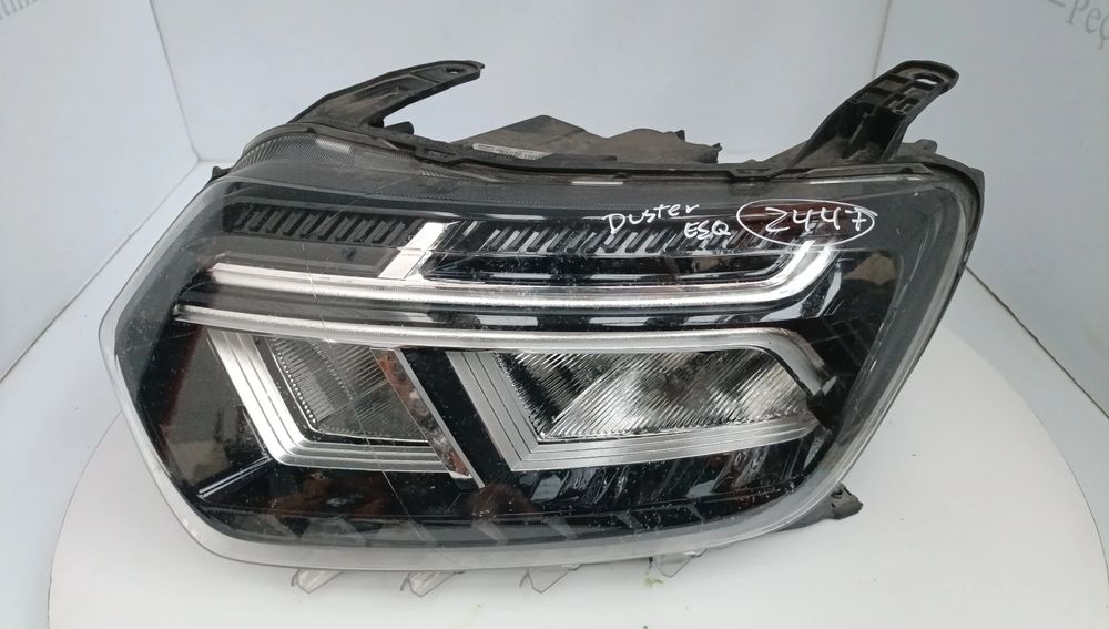 Ótica / farol esquerda DACIA Duster (HM_)