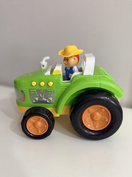 Grający traktor z figurką farmera
