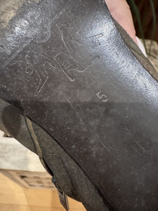 Botas cano alto castanhas