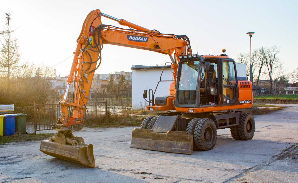 Odśnieżanie Koparko-ładowarka 4ośka