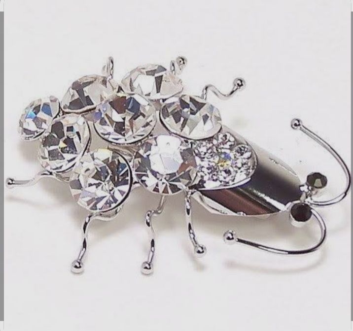 Брошки прикраси.