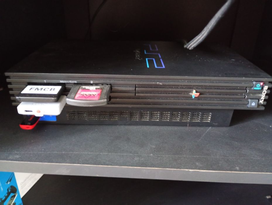 Setup completo  ps2 + TV 29" triniton + fmbc + pen-drive com jogos + 8bitdo + conversor para hdmi + comando ps5 + jogos originais + móvel TV