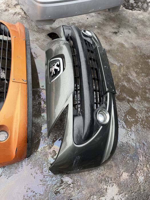Бампер передній Peugeot 207