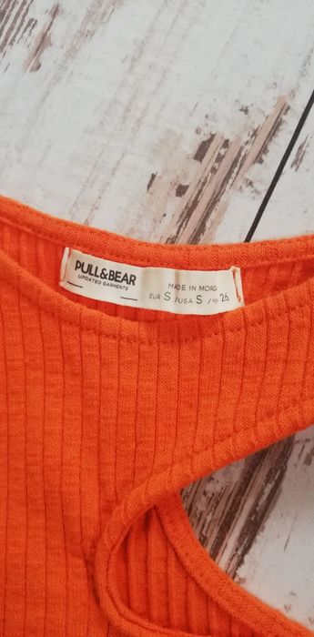 Bluzka pomarańczowa z jednym rękawem