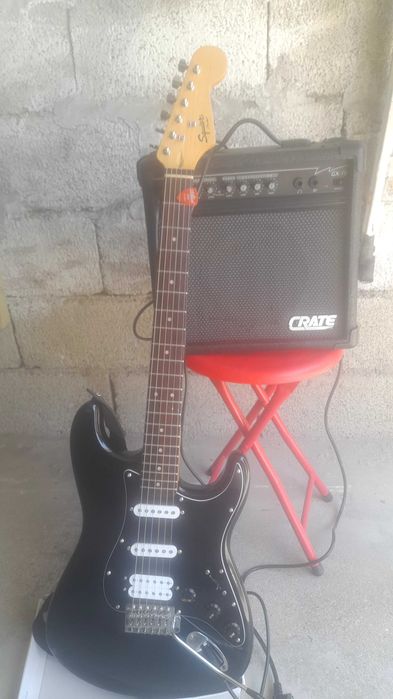 Guitarra eléctrica amplificador saco e cabos