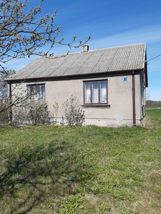 Działka z domem i budynki gospodarcze