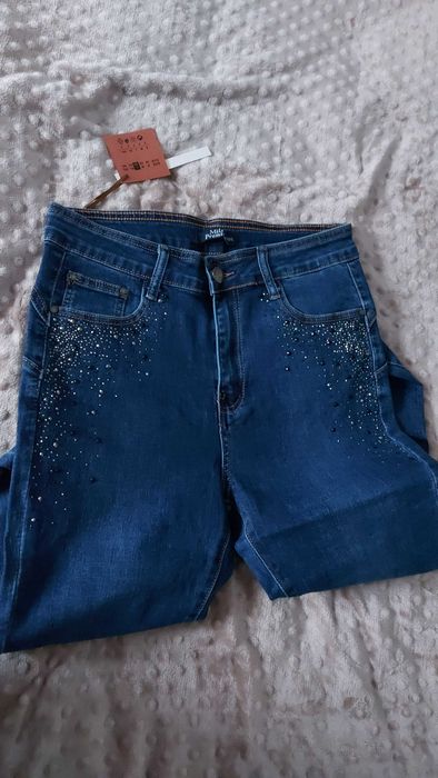 Dżinsy granatowe z cyrkoniami .