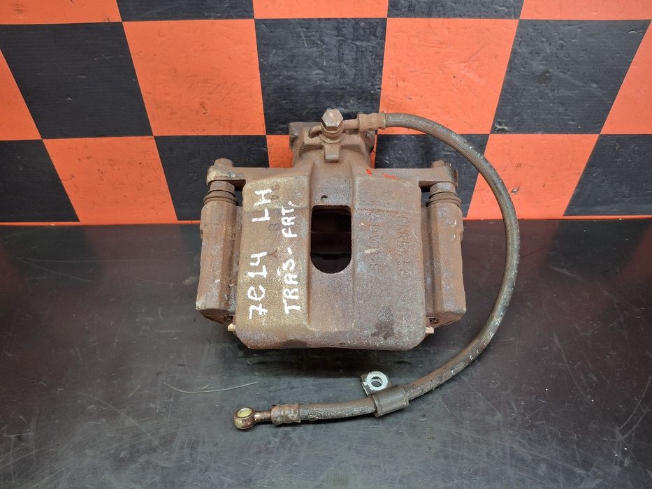 Pinça travão / maxila de travão trás esquerda MITSUBISHI TRUCKS Canter