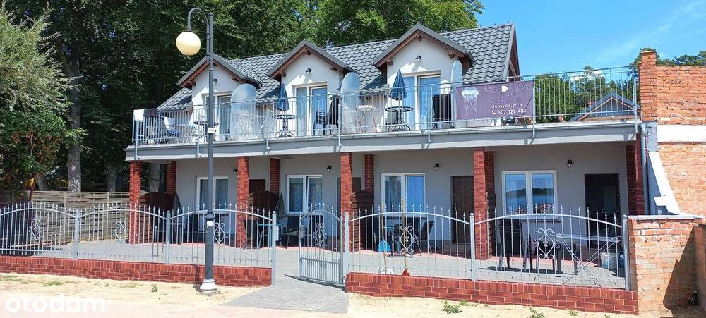 Pensjonat willa obiekt noclegowy Skorzęcin przy samej plaży 12 pokoi