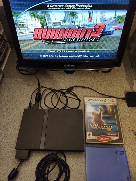 PlayStation 2 + comando + jogos